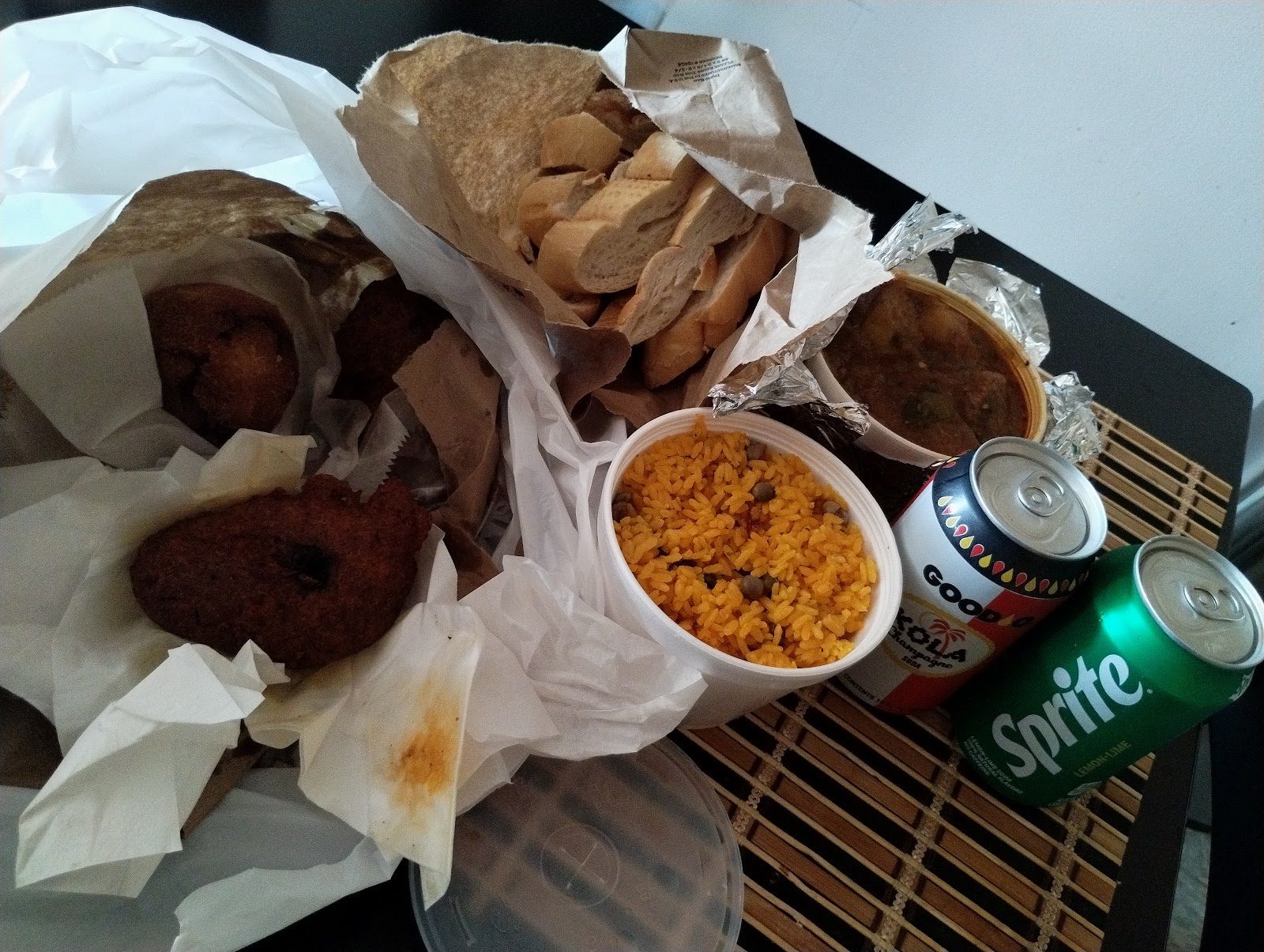 Takeout with alcapurrias and rice